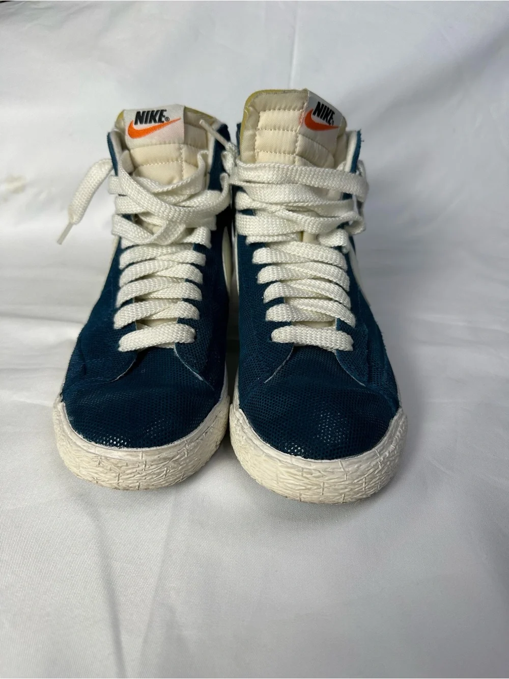 Nike Blue High-Top Sneakers with White Swoosh